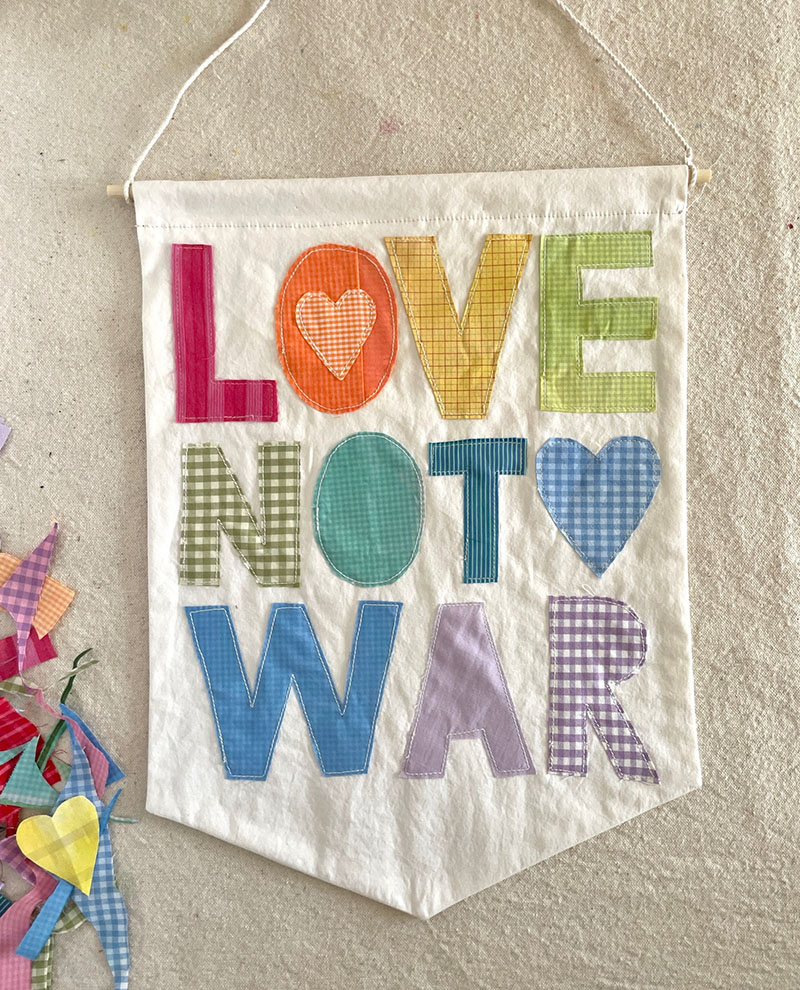 Love not War fabric banner DIY. Raise money for Save the Children.