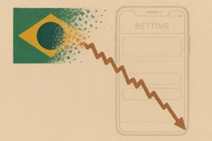 Illustration of a falling share price line over a Brazilian flag motif, representing Brazil's online gambling ban